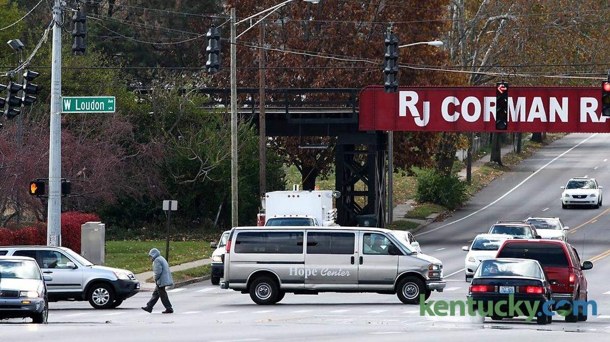A pedestrian used the crosswalk at the intersection of Broadway and Louden in Lexington, Ky., on Nov. 14, 2014. Photo by Pablo Alcala | Staff
