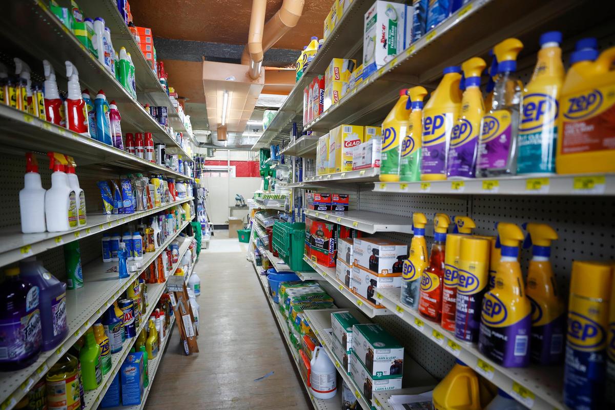 Cleaning supplies sit on shelves Thursday in the newly expanded section at Chevy Chase Hardware. In addition to green lightbulbs, Chevy Chase Hardware is currently selling PPE equipment such as face masks and cleaning supplies.