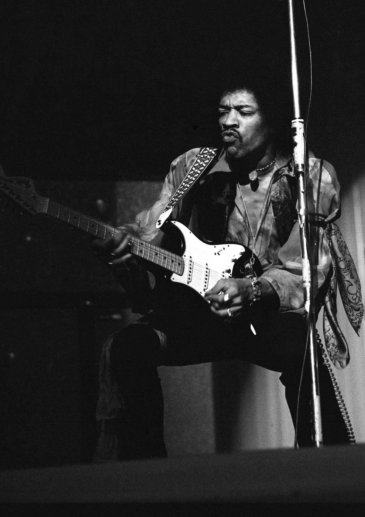 Jimi Hendrix playing his guitar on tour in Germany at the Rheinhalle in Dusseldorf on Jan. 14, 1969.