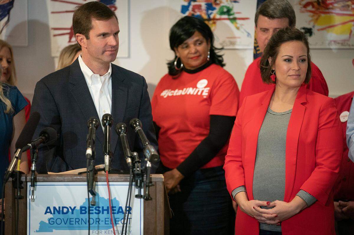Kentucky Democratic gubernatorial candidate and Attorney General Andy Beshear stands with Lt. Governor candidate Jacqueline Coleman, while speaking to the media during a press conference at the Muhammad Ali Center, Wednesday, Nov. 6, 2019, in Louisville, Ky. (AP Photo/Bryan Woolston)