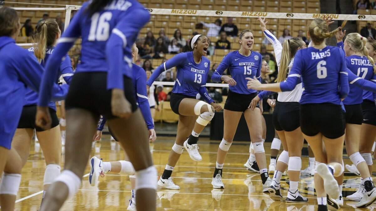 The University of Kentucky volleyball team, including Leah Edmond (13), defeated Missouri 3-0 on Sunday to clinch the seventh regular-season Southeastern Conference title in program history.