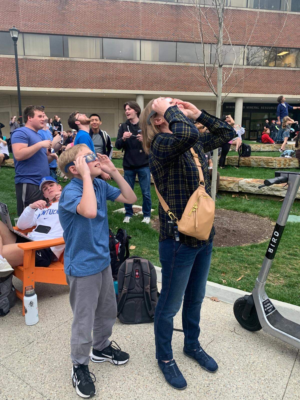 Donna Lee and her son watch the eclipse April 8, 2024.
