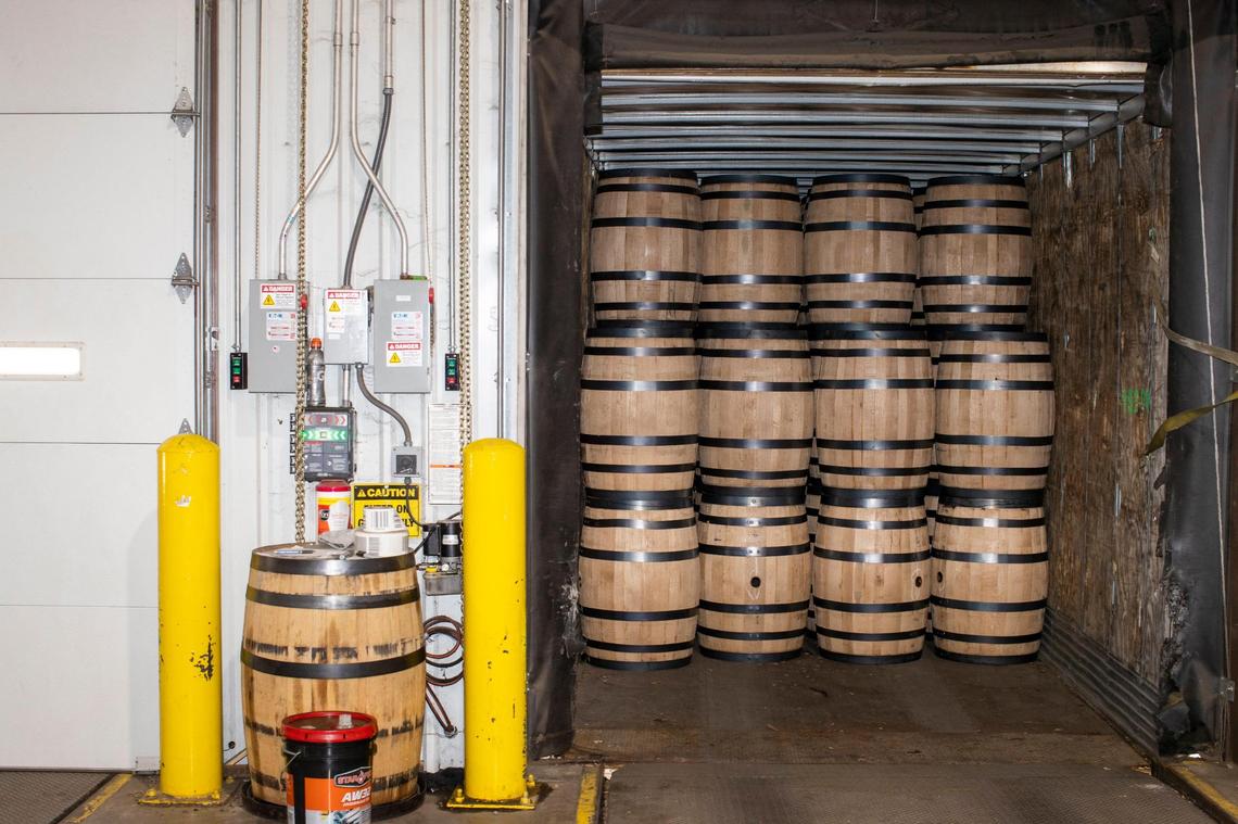 Finished white oak barrels sit waiting for transportation to various bourbon brands from Robinson Stave Mill and East Bernstadt Cooperage in East Bernstadt, Ky., Sunday, December 13, 2021.