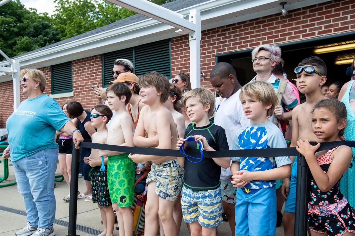Children wait for Mayor Linda Gorton to open Paradise Lagoon, the new shipwreck-themed feature at Woodland Aquatic Center before announcing the opening in Lexington, Ky., Friday, May 26, 2023.