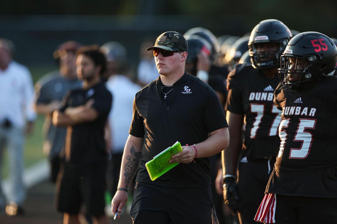 Paul Laurence Dunbar’s Ethan Hampton looks on from the sidelines during the Bulldogs’ home game against Tates Creek at Jon R. Akers Stadium on Sept. 29.