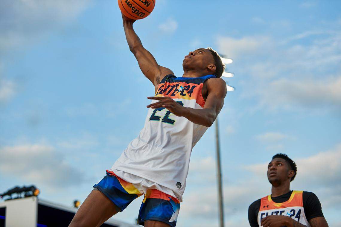 Class of 2024 Kentucky men’s basketball recruit Tre Johnson attempts a layup during the Under Armour Next Elite 24 event in August in Chicago.