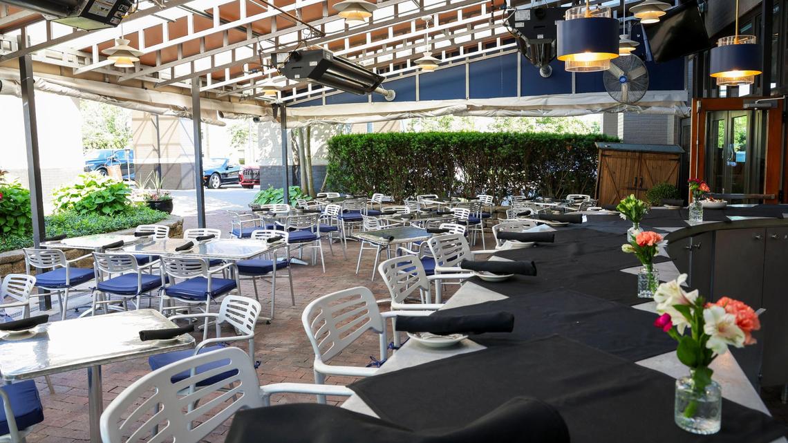 The outside bar and patio dining area at Azur Restaurant and Patio, shown Monday, May 20, 2025 in Lexington, Ky., has the same familiar look after the popular dining spot closed at the end of 2024 because there were unable to negotiate a new lease. But they, along with its popular patio dining space, will reopen officially on May 23 after a five-month absence.