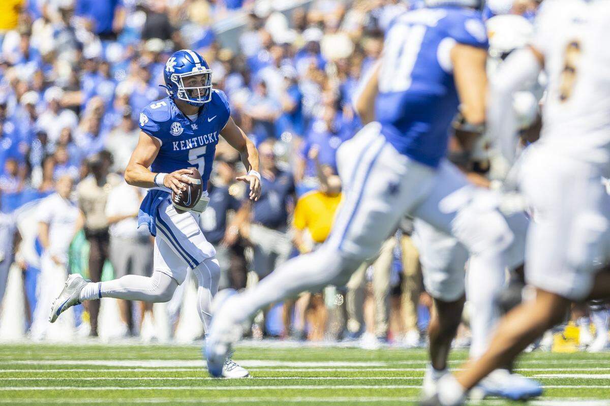 Kentucky quarterback Zach Calzada (5) looks to pass the ball during against Toledo on Saturday at Kroger Field.