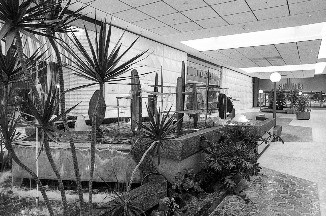 THEN: Shillito’s Department Store can be seen in the background of this photo inside the new Fayette Mall, taken days before it opened on Oct. 11, 1971 in Lexington, Ky. The wide walkways and live plants were designed on purpose to give shoppers the feeling of walking on a Florida street. Wenneker’s shoe store can be seen in the middle of the image above the fountain. There were four fountains in the new mall.