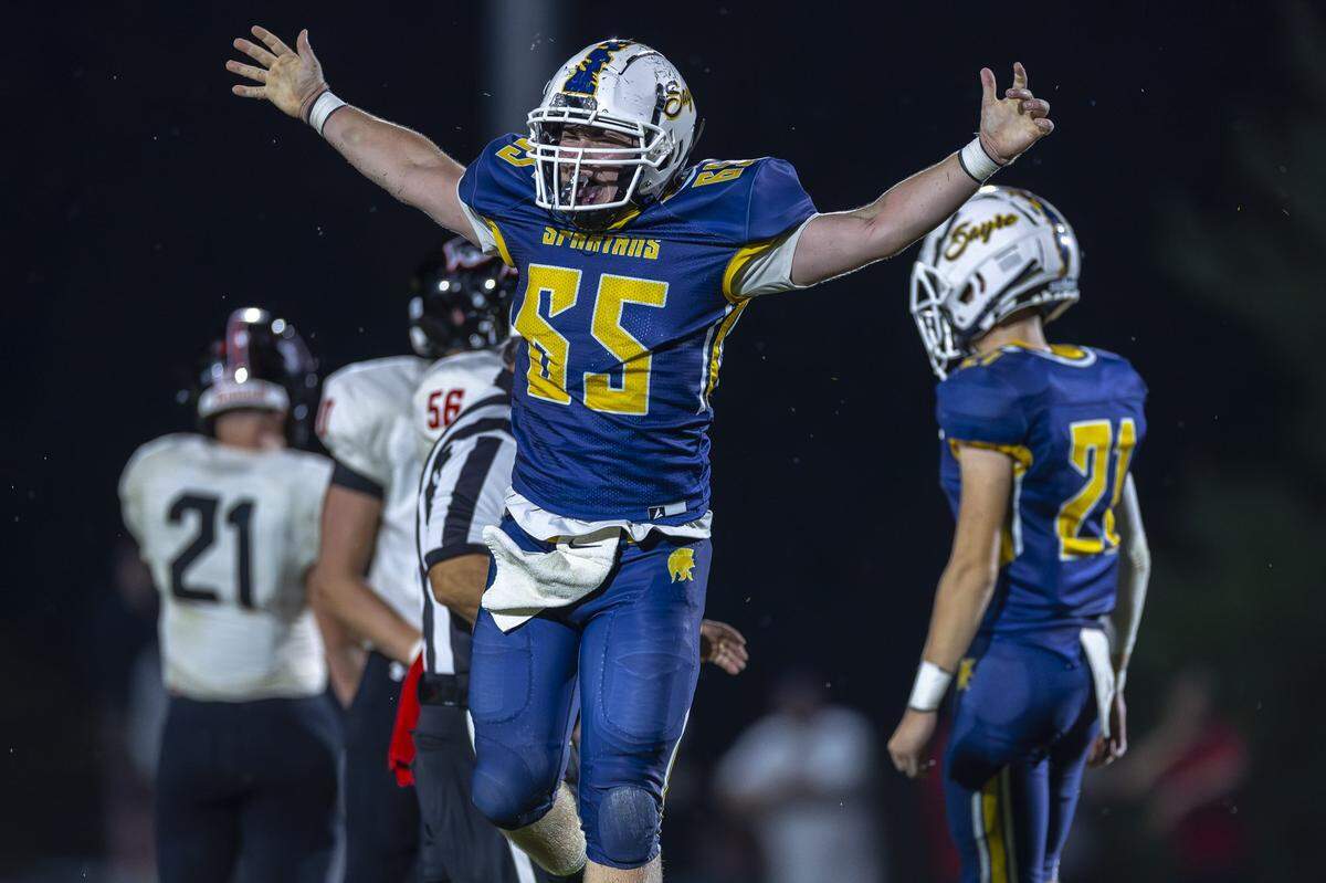 Sayre’s Jud Masters (65) celebrates after sacking Ludlow’s Jackson Mays during a game at the Sayre Athletic Complex on Sept. 6.