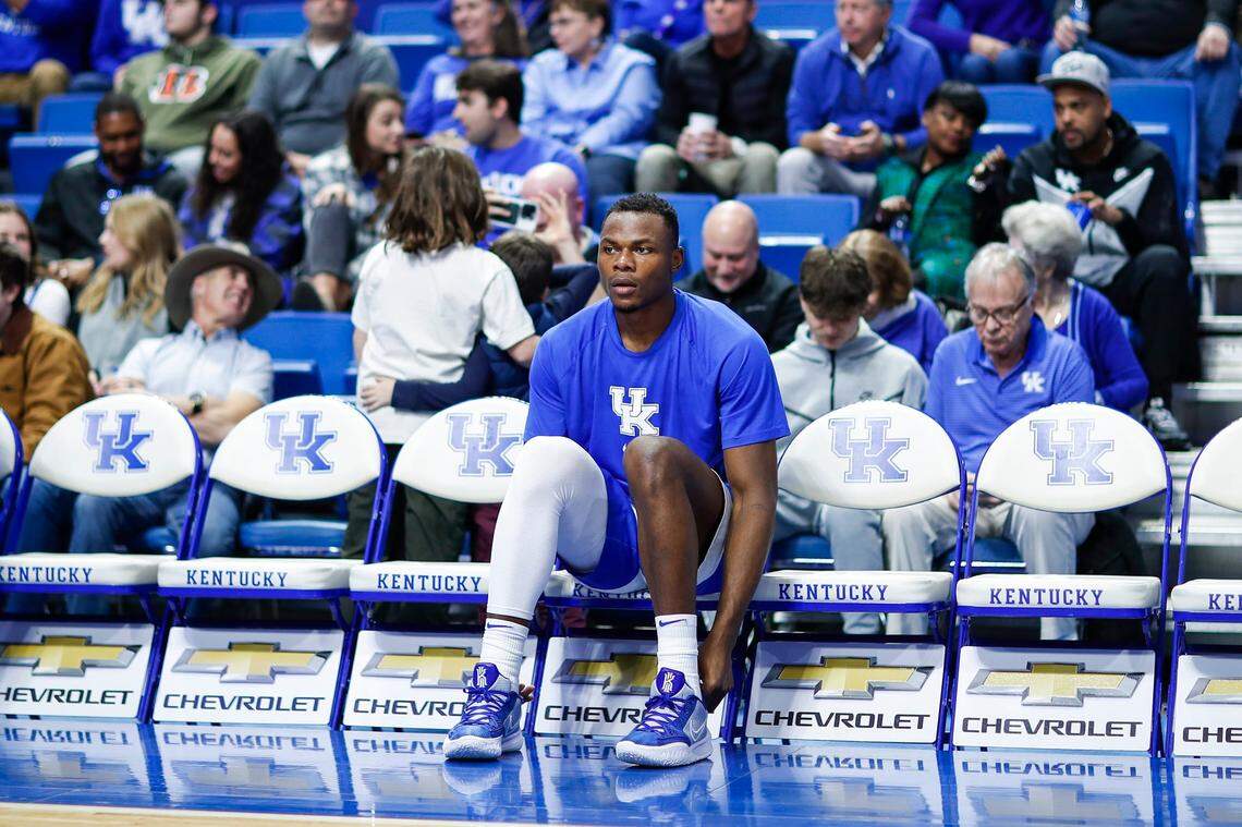 Kentucky basketball star Oscar Tshiebwe sits on the bench before facing the South Carolina Gamecocks on Tuesday. South Carolina upset UK 71-68.