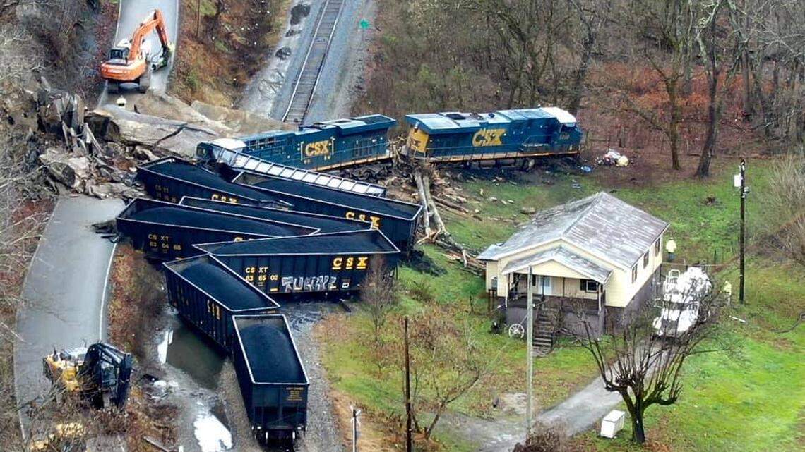 A rock slide caused a train hauling coal to derail in Wallins Creek, Harlan County early Thursday morning. Crews worked to remove the train and the boulder thoughout the day.