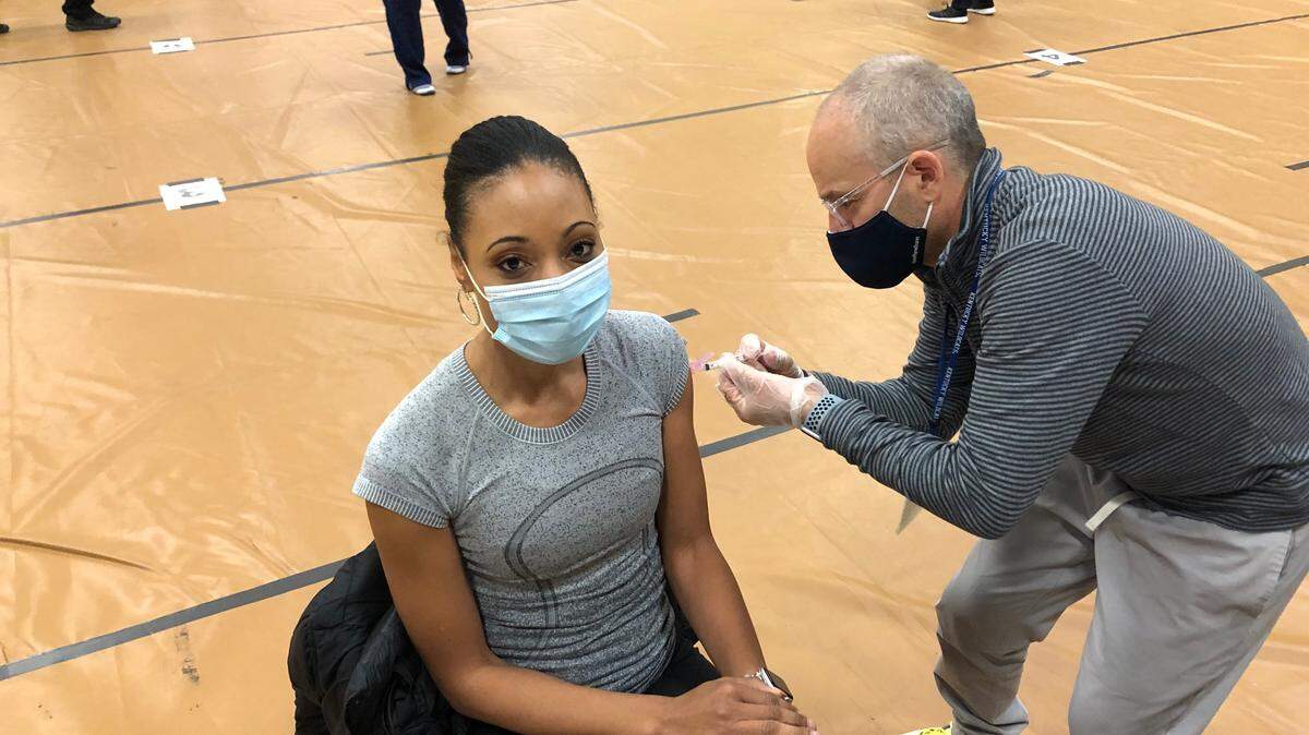 PA DeShana Collett received her COVID-19 vaccination last month.