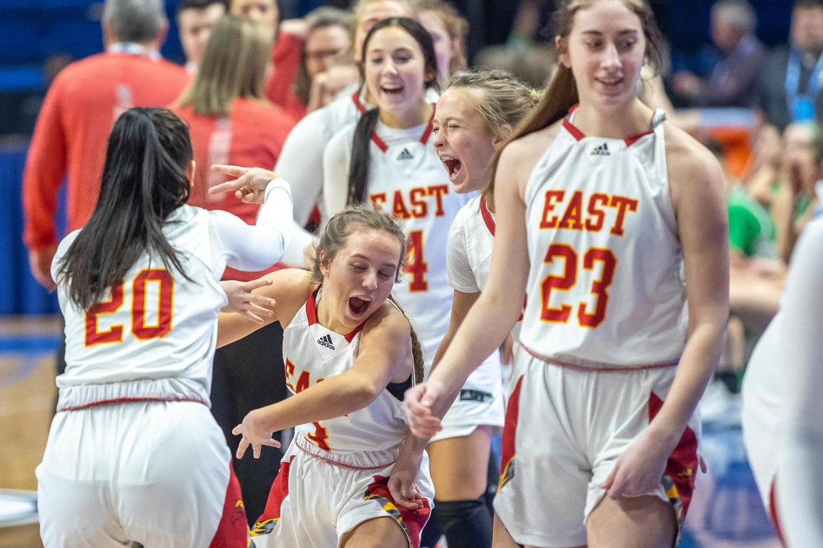Bullitt East players celebrate after the Lady Chargers defeated Meade County to advance to Saturday’s state semifinals.
