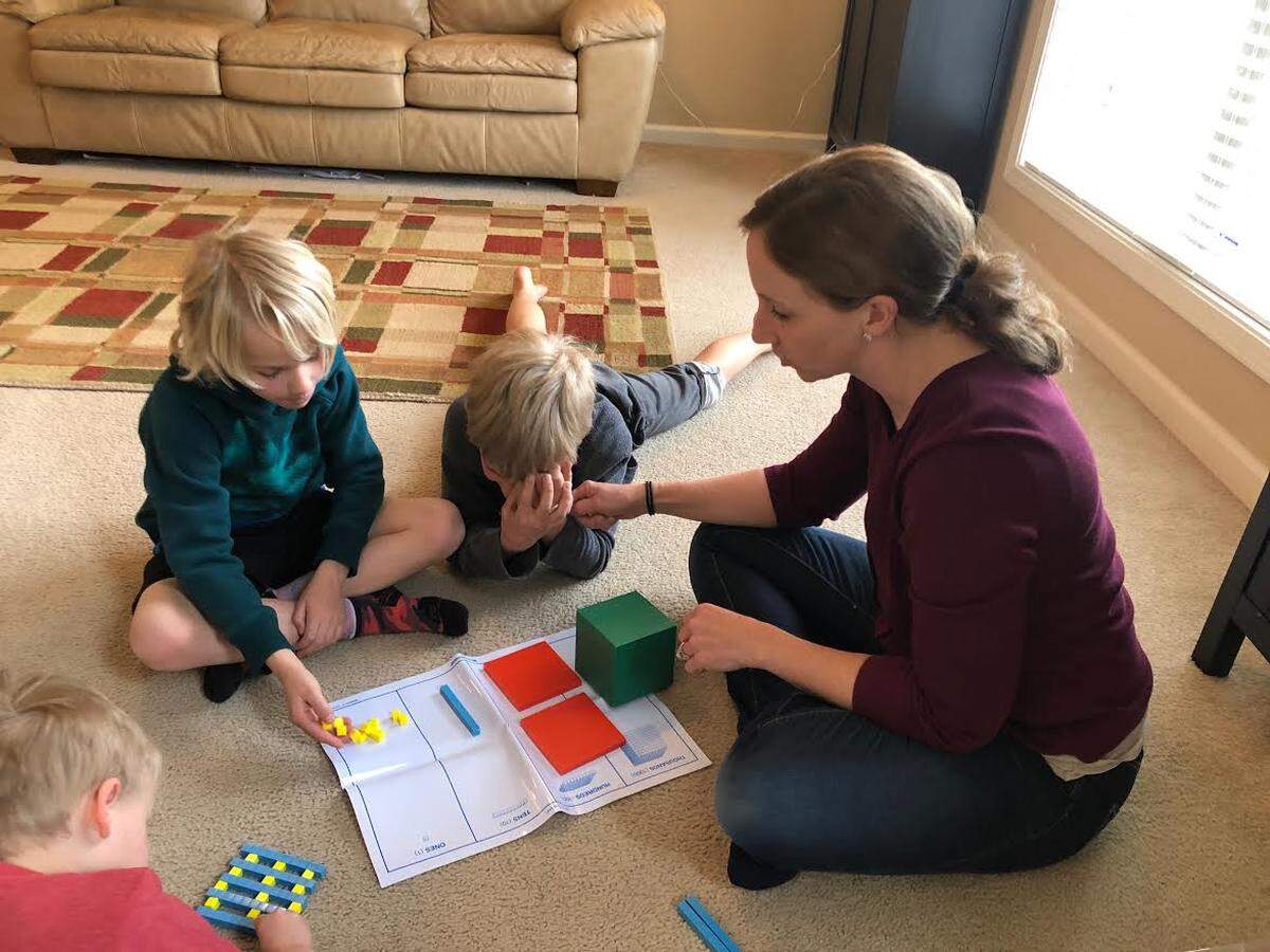 Home school mother Joy Shepard and her children Liam Shepard. 8, Keegan Shepard, 10, and Gavin Shepard, 4, worked on lessons at their Lexington home in 2020.