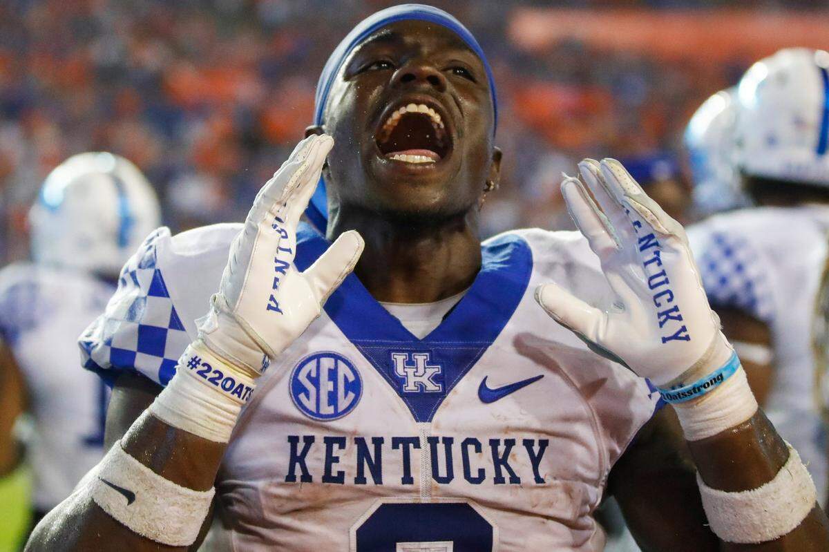 Kentucky running back Kavosiey Smoke celebrates in the final minutes of the Wildcats’ win at Florida on Saturday night. Through two games starting in place of the suspended Chris Rodriguez, Smoke leads UK with 112 rushing yards.