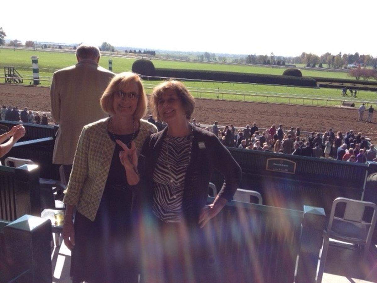 Beverly Joseph Crain (left) poses for a photo with longtime friend Nancy Guthrie at Keeneland in Lexington, Ky., in 2014. Guthrie, 84, has been the subject of a major missing persons case after she went missing from her Arizona home on Feb. 1.