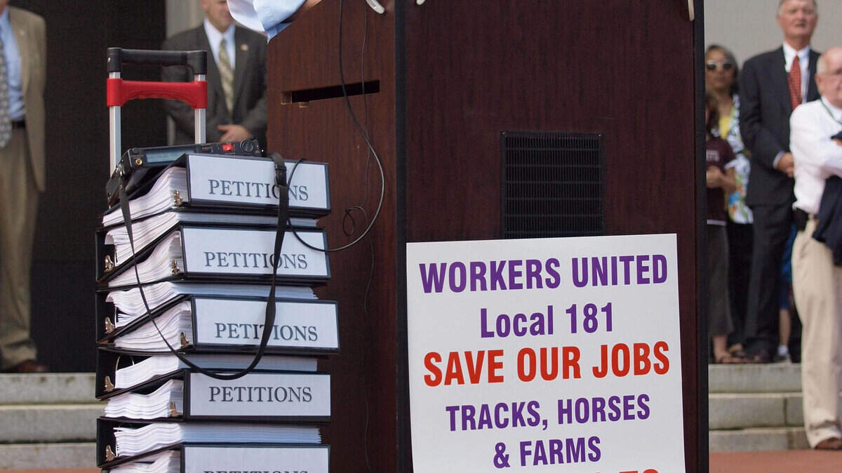Gov. Steve Beshear spoke at a pro-slot machine rally on the Capitol steps in June 2009.
The slots bill was never passed.
