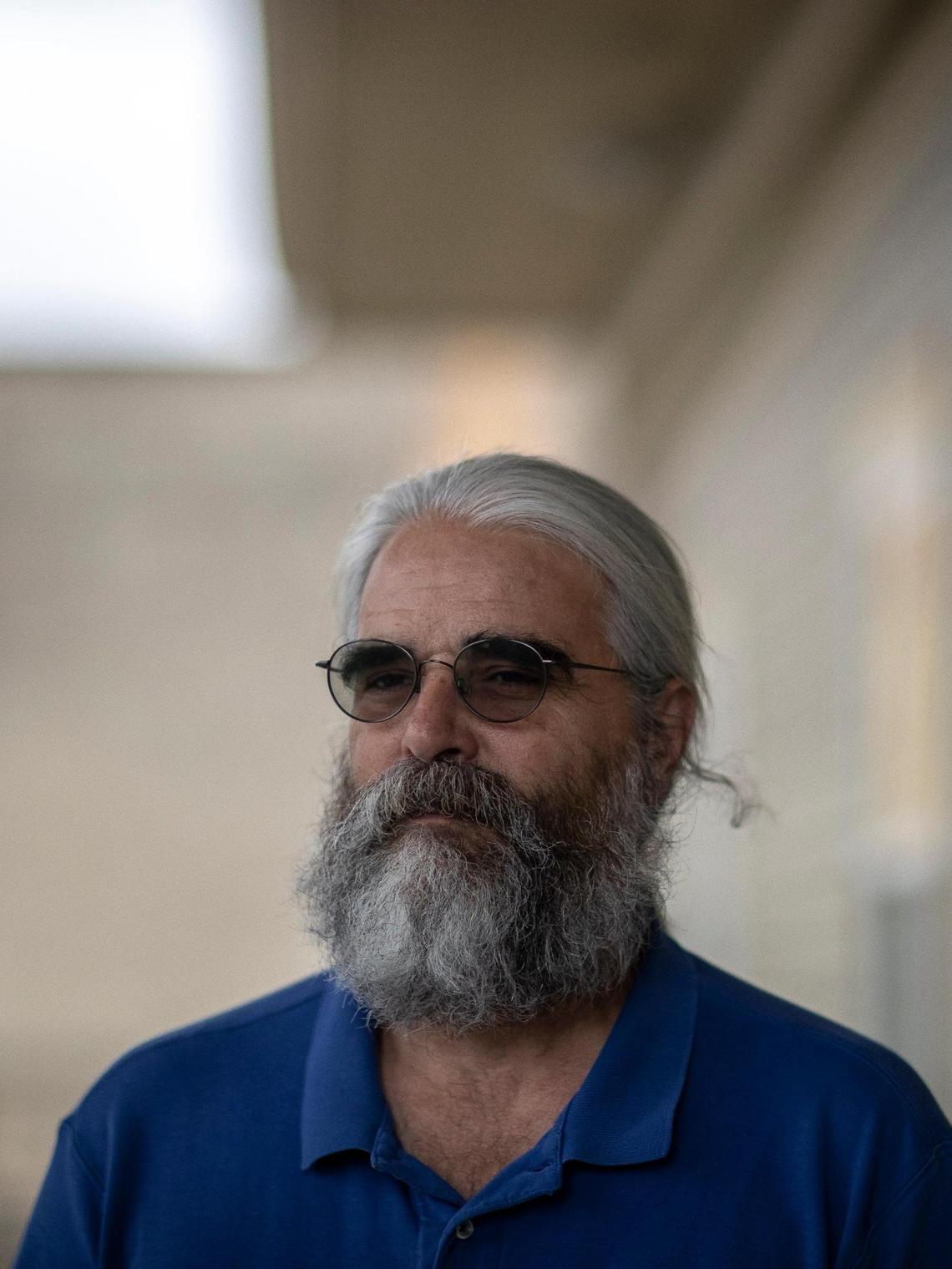 Scott McReynolds, Housing Development Alliance executive director, poses for a portrait outside his office in Hazard, Ky., on Wednesday, Oct. 26, 2022.