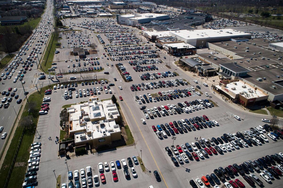 Shoppers fill the parking lot of Fayette Mall at 1:52 p.m. in Lexington, Ky., Saturday, March 20, 2021.