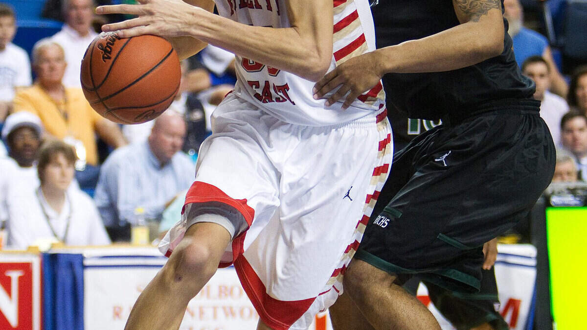 Bullitt East forward Derek Willis drove toward the basket during a state tournament game.
