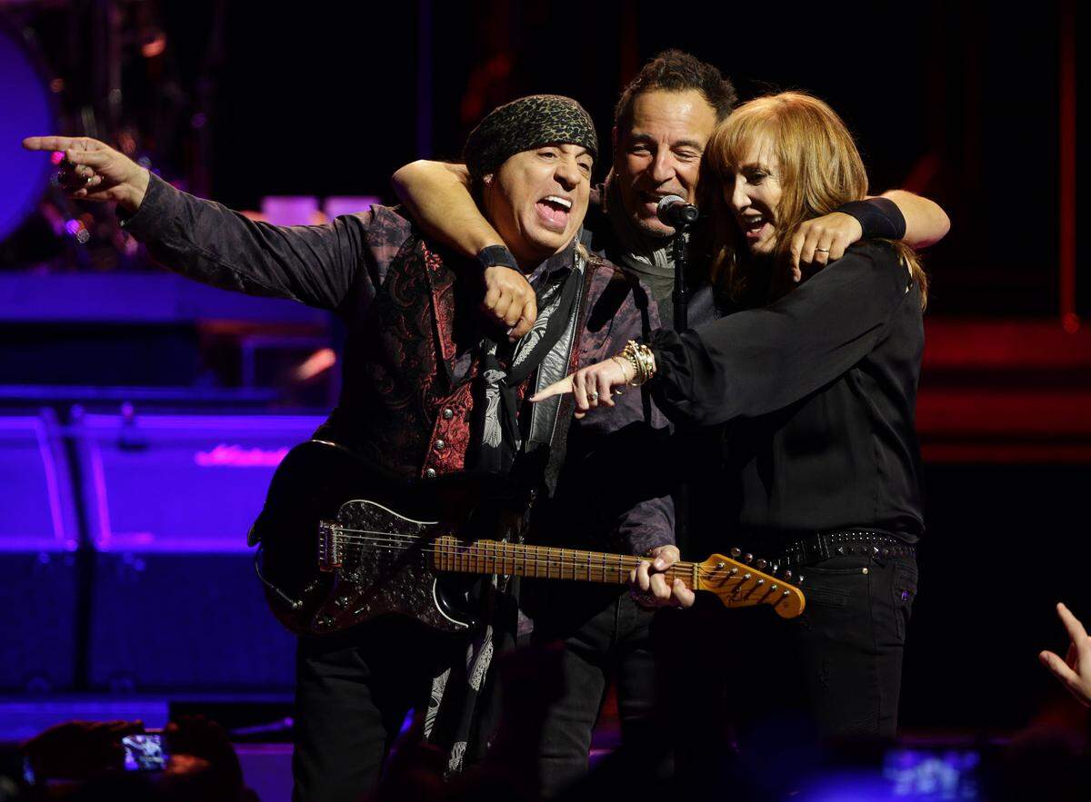 Guitarists Stevie Van Zandt, left, joined Bruce Springsteen and Patti Scialfa,  at the mic as they   played a three-hour show during The River tour at the YUM center on Monday February 21, 2016, in Louisville, Ky. It was one of several Springteen concerts that Walter Tunis reviewed for the Herald-Leader.