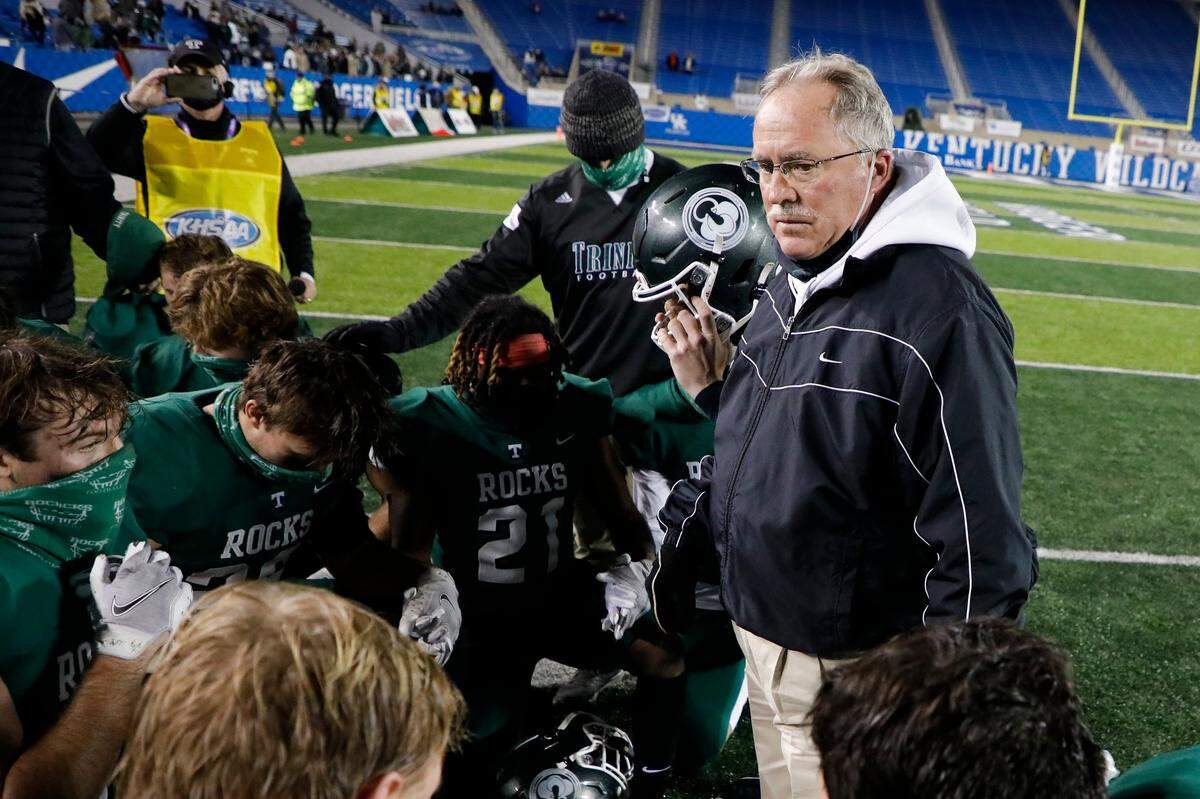 Bob Beatty spoke to his Trinity team before the Shamrocks beat Male 28-0 in the Class 6A state title game at Kroger Field to win their 15th state championship in Beatty’s 21 years as head coach.