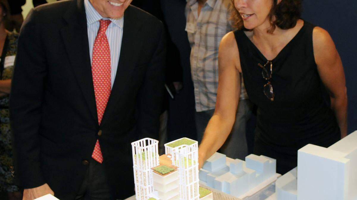 Jeanne Gang of Studio Gang Architects showed Mayor Jim Gray a model of her concept for the CentrePointe block during a public meeting Thursday. Gray introduced Gang to the property's developers, Dudley and Woodford Webb.  