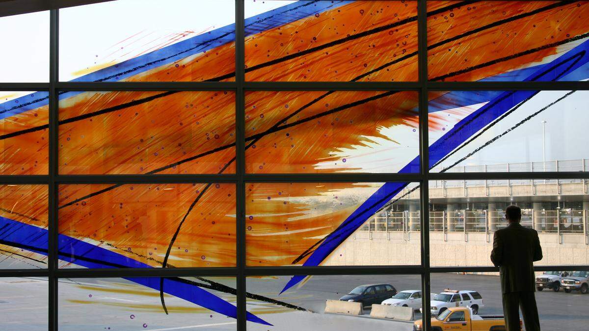 Guy Kemper designed this stained-glass window, called Celestial Passage, for Baltimore/Washington International Thurgood Marshall Airport in 2005. Several other airports have his windows.