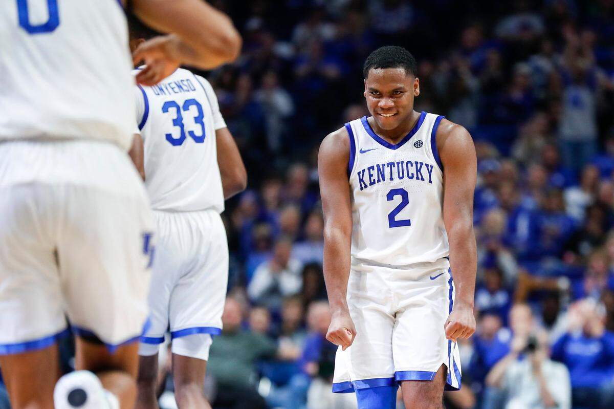 Kentucky’s Sahvir Wheeler (2) celebrates after making an assist on a basket against the Duquesne Dukes during Friday’s game at Rupp Arena.