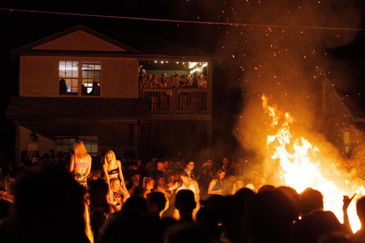 University of Kentucky students and fans gather on State Street in Lexington, Kentucky to burn couches after Kentucky football’s 26-16 win at Florida on Saturday, Sept. 10, 2022.