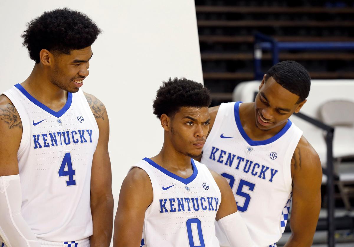 Nick Richards, left, and PJ Washington, right, laughed as Quade Green, middle, made a funny face during the University of Kentucky basketball team’s annual photo day in Memorial Coliseum on Thursday.