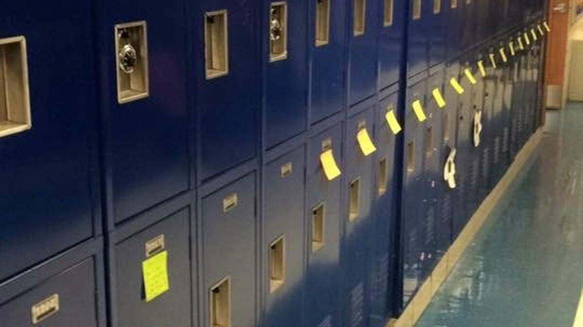 Many post-it notes containing Bible verses remained on the lockers at Paintsville High School.