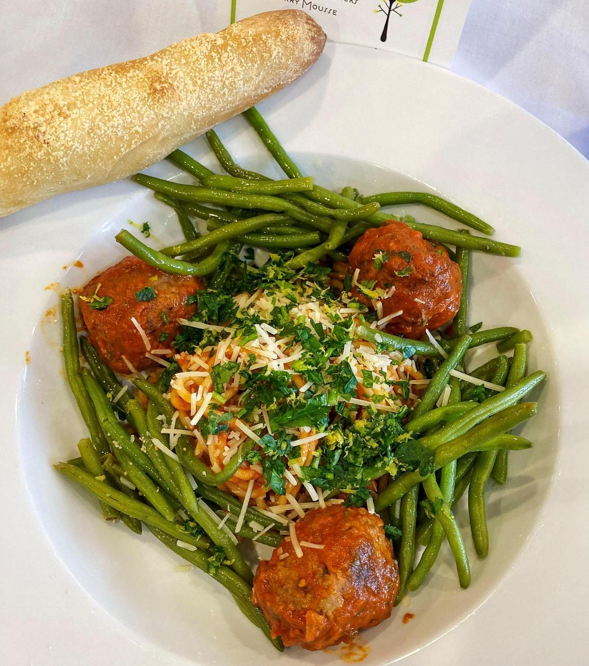 Spaghetti, meatballs and sautéed haricots vert, served during dine-in service Jan. 25, 2022 at The Lemon Tree, the University of Kentucky student-run restaurant on the UK campus. The popular UK restaurant, a living classroom operated by the Department of Dietetics and Human Nutrition, has a new takeout option.