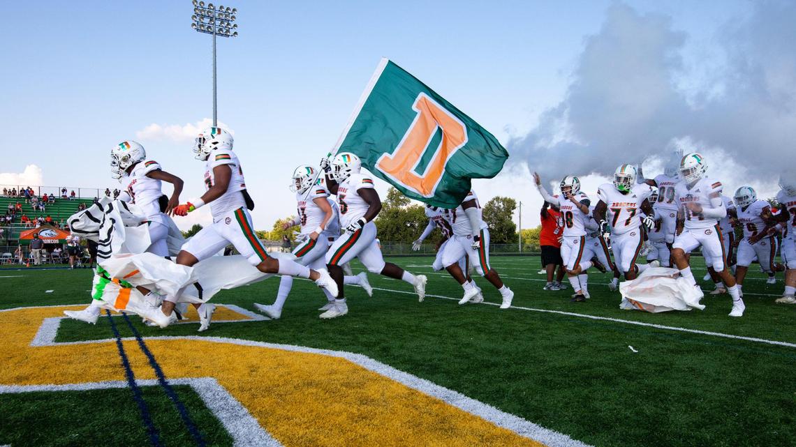 Frederick Douglass runs onto the field before a game earlier this season. The Broncos host Southwestern in the Class 5A quarterfinals on Friday night.