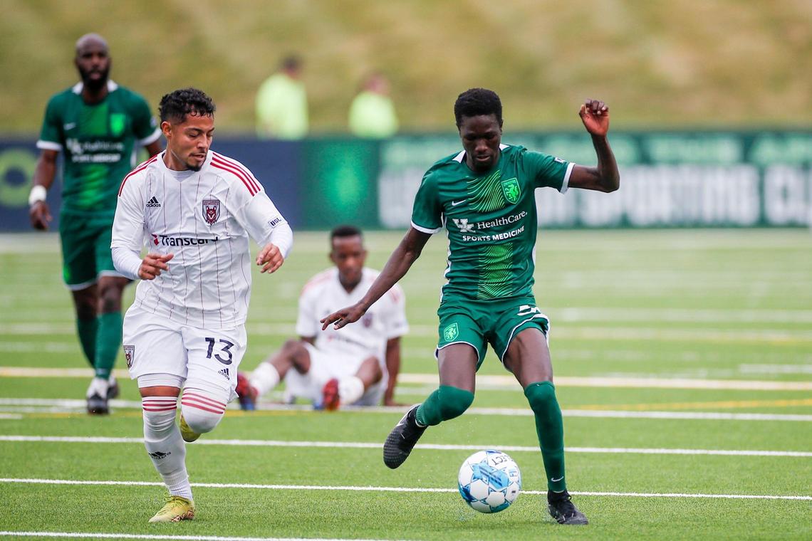 Lexington Sporting Club midfielder Ates Diouf (32) dribbles during a match last season. Diouf and LSC lost in the first round of the Lamar Hunt U.S. Open Cup on Tuesday night to Vermont Green FC.