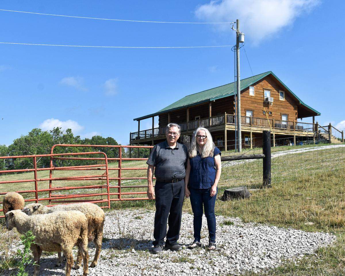 Don Bowles and Lanette Freitag, shown on their Bourbon Co. farm, invented a machine to turn raw animal fibers into fabric for felt hats, garments, rugs and other goods.