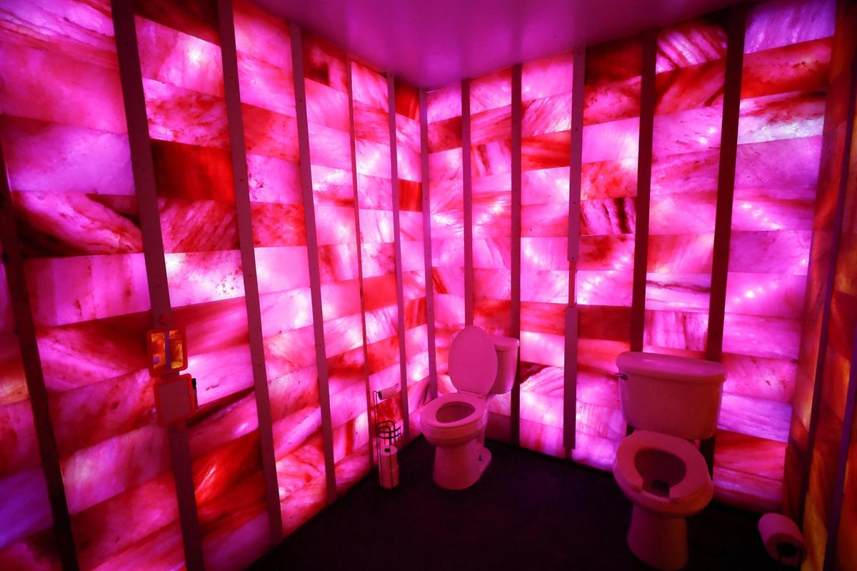 Colored lights shine through salt blocks in the women’s bathroom at Waterfront Grille & Gathering in Winchester. The bathrooms, bar, deck were part of the renovations after an ice storm and flooding at the waterfront dining restaurant. Still to come are the concert hall and a dock on the Kentucky River.