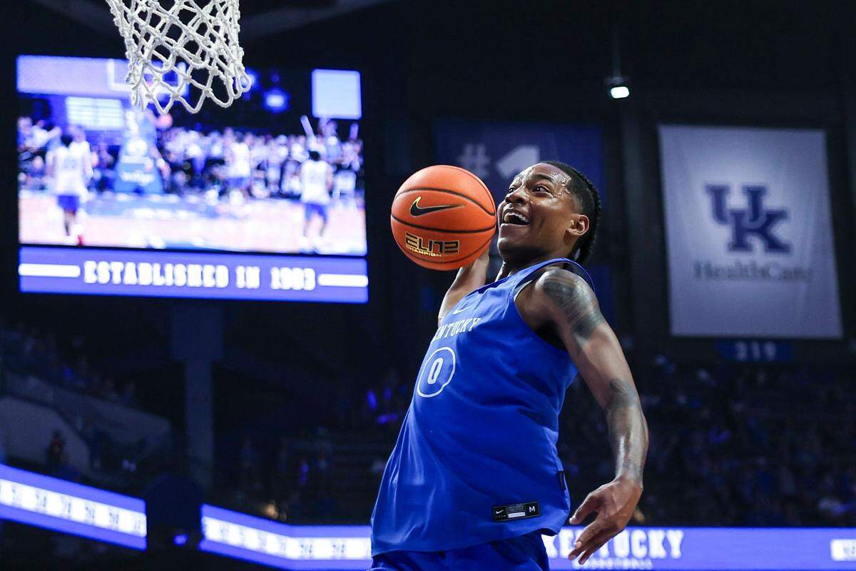 Kentucky guard Rob Dillingham dunks the ball during the scrimmage during Big Blue Madness at Rupp Arena on Oct. 13.