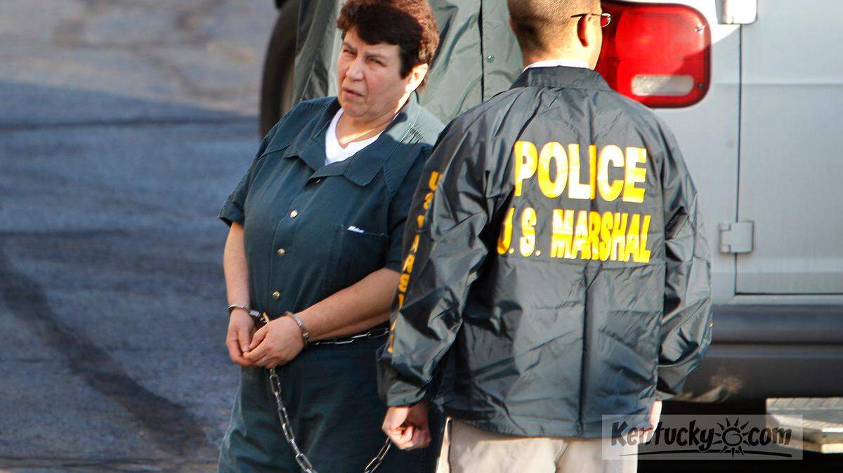 U.S. Marshals escorted Azra Basic, left, into the Federal Courthouse in Lexington, on Thursday, March 17, 2011.  Basic, a Croatian-born woman, was arrested Tuesday in Kentucky, and is wanted by the government of Bosnia and Herzegovina for alleged war crimes in Bosnia.
