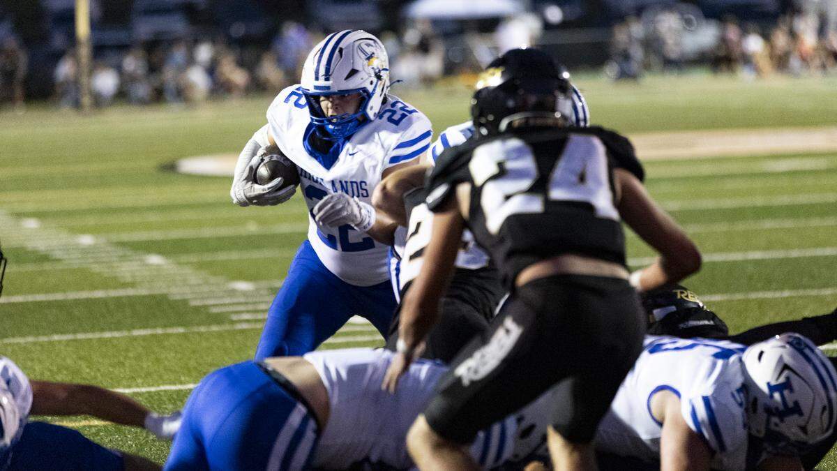 Highlands junior Tayden Lorenzen looks for an opening at the goal line in the first half against Boyle County at Rebel Stadium in Danville on Friday.