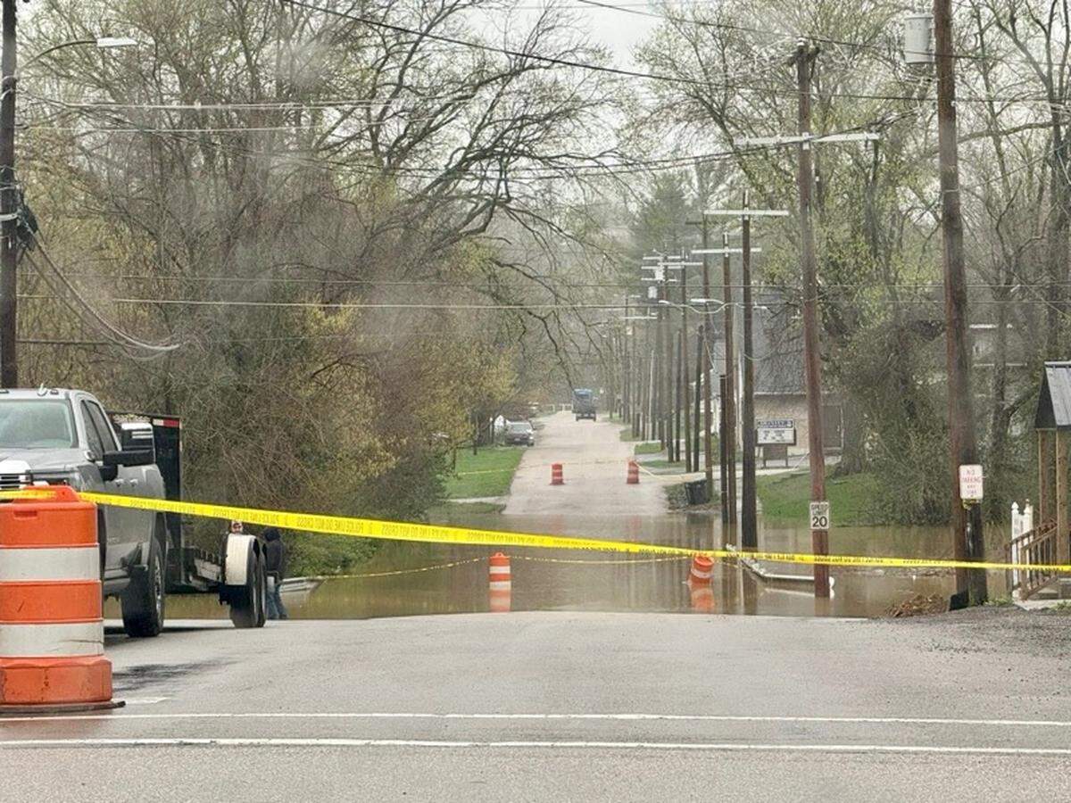 Floodwaters continued to rise Sunday, April 6, 2025 in Falmouth. Pendleton County officials issued emergency evacuation orders for Falmouth and Butler on Saturday, and access to much of Falmouth and all of Butler was cut off Sunday.
