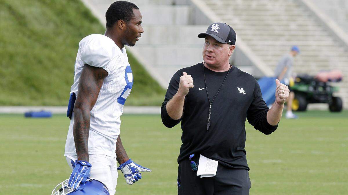 Coach Mark Stoops talked to cornerback Derrick Baity on Tuesday during practice. Kentucky’s secondary is a veteran group that returns 59 starts. They want to prove some doubters wrong. “We hear the outside talk,” Baity said. “We know we haven’t been living up to the expectations.”