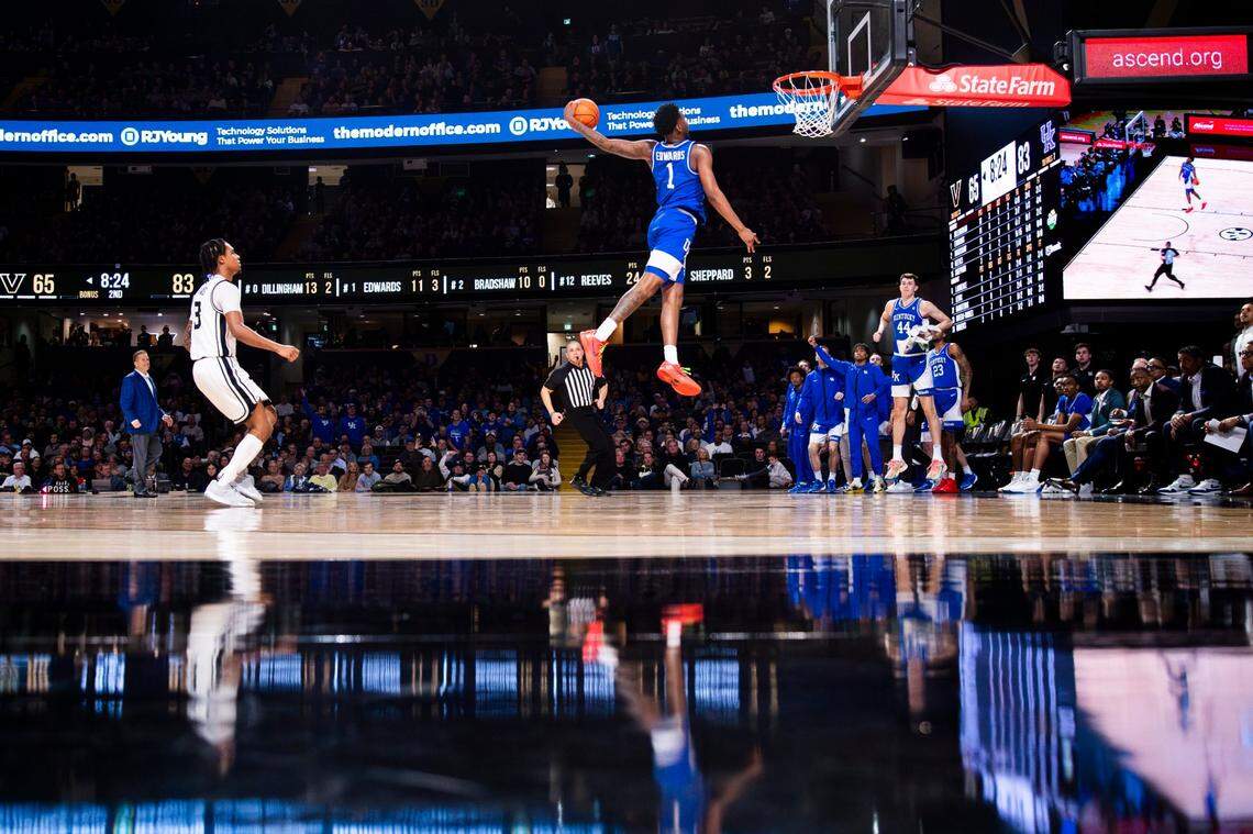 Kentucky guard Justin Edwards (1) dunks on a breakaway play against Vanderbilt during Tuesday’s game at Memorial Gymnasium in Nashville, Tennessee. Edwards scored a career-high 17 points.
