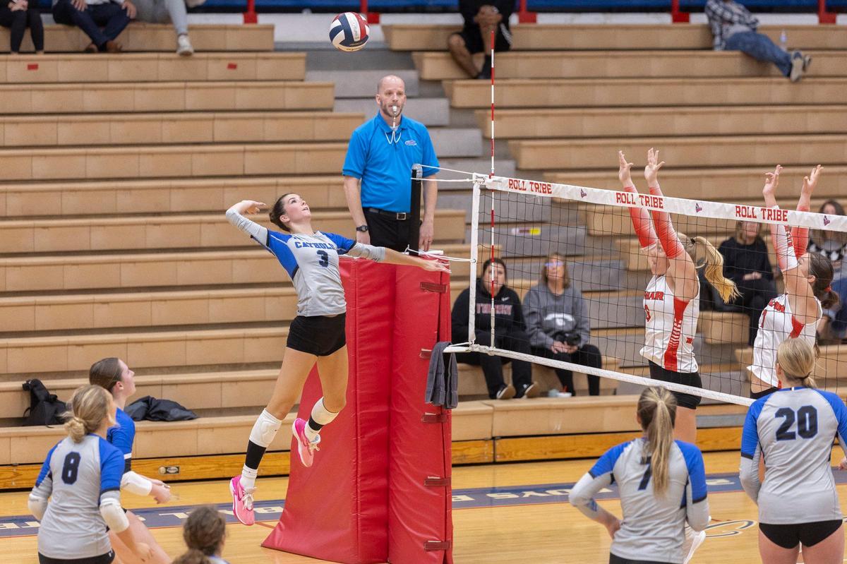 Lexington Catholic’s Addie Lowe (3) went up for a kill against Paul Laurence Dunbar during the 11th Region volleyball tournament championship at Madison Central High School in Richmond on Oct. 31. Lowe received Lexington’s Chris Beerman Senior Award this season.