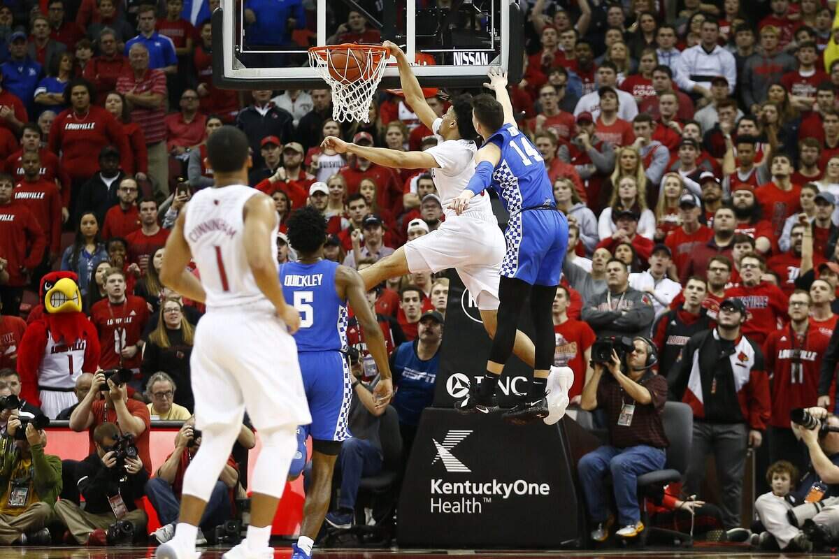 Louisville forward Jordan Nwora (33) dunked on Kentucky guard Tyler Herro (14) during U of L’s 71-58 loss to UK last season. Nwora had 17 points, seven rebounds and three steals in that game but made only seven of 17 shots, including one of five three-pointers.