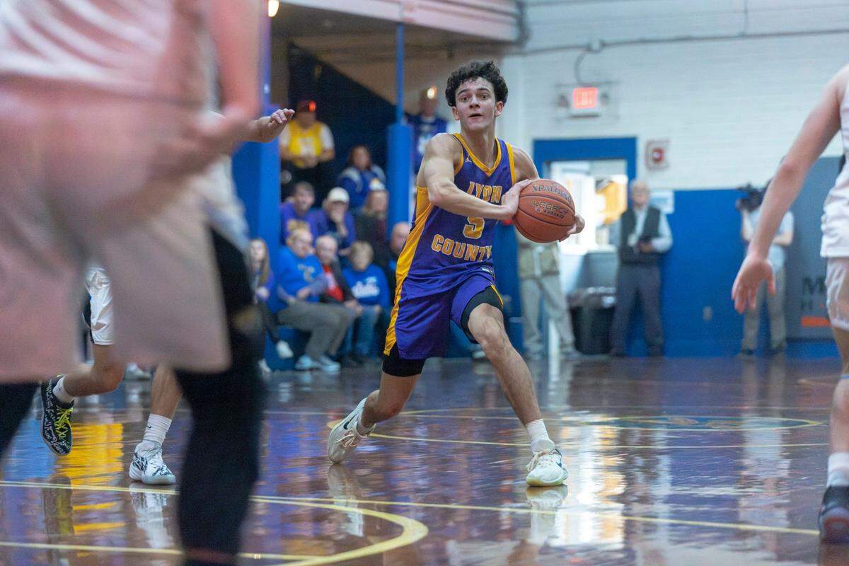 Lyon County’s Jack Reddick looks to pass the ball during a game against Floyd Central at Wayland Gymnasium at the Mountain Sports Hall of Fame in Wayland on Dec. 16, 2023.