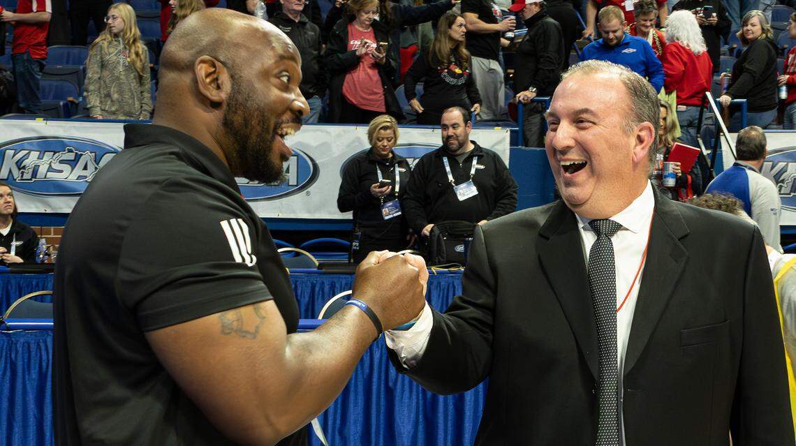 Taylor County coach Donnie Swiney celebrates the 60-58 victory over West Jessamine following the 2026 Clark's Pump-N-Shop Girls' Basketball Sweet 16 state tournament game at Rupp Arena on March 11, 2026, in Lexington, Kentucky.