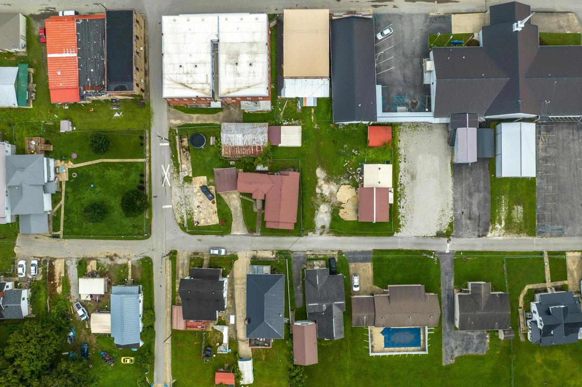Beneath the flood waters a year ago were the roads, homes and businesses of residents in Garrett, Ky.