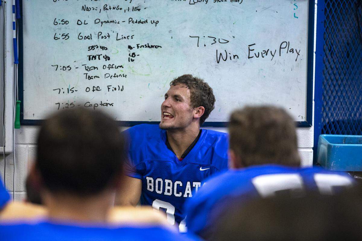 Breathitt County’s Charles Collins talks to his teammates in the locker room before taking on South Laurel.